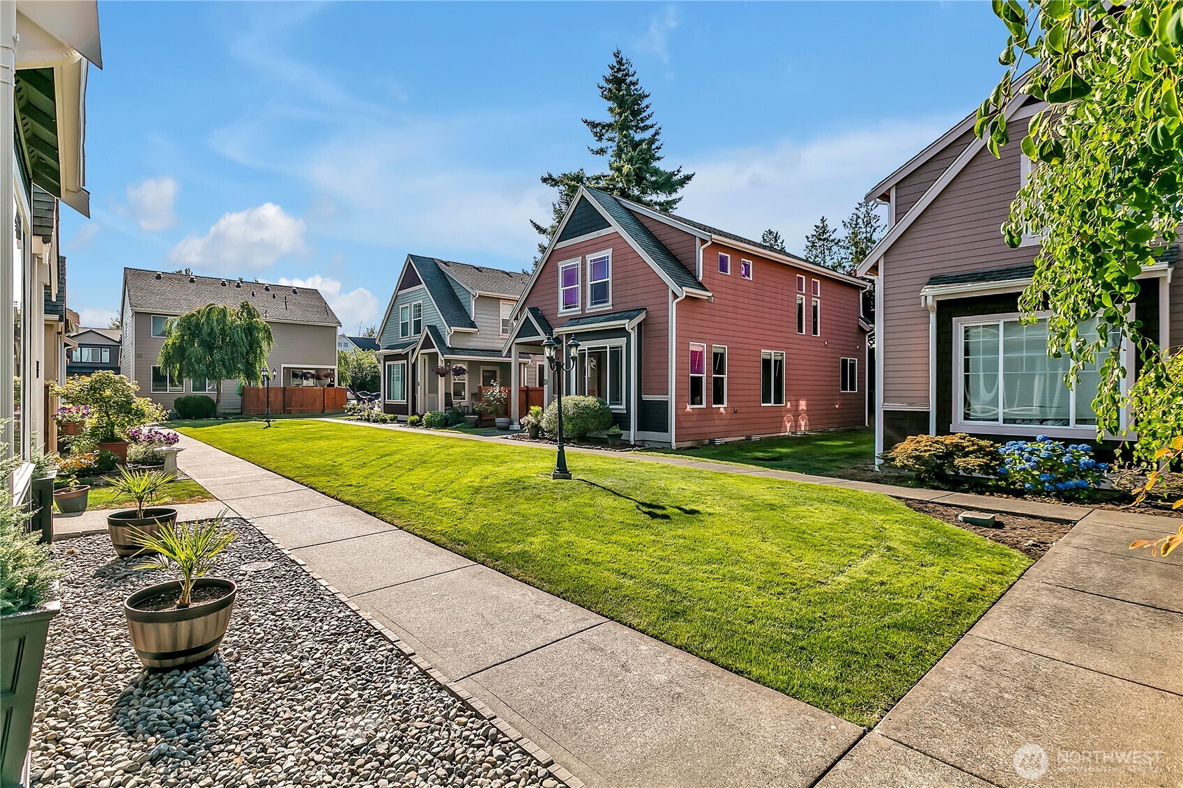 1720 Garfield Street, Unit 4 Enumclaw, WA 98022 - Photo 6 of 38 a front view of house with yard and green space