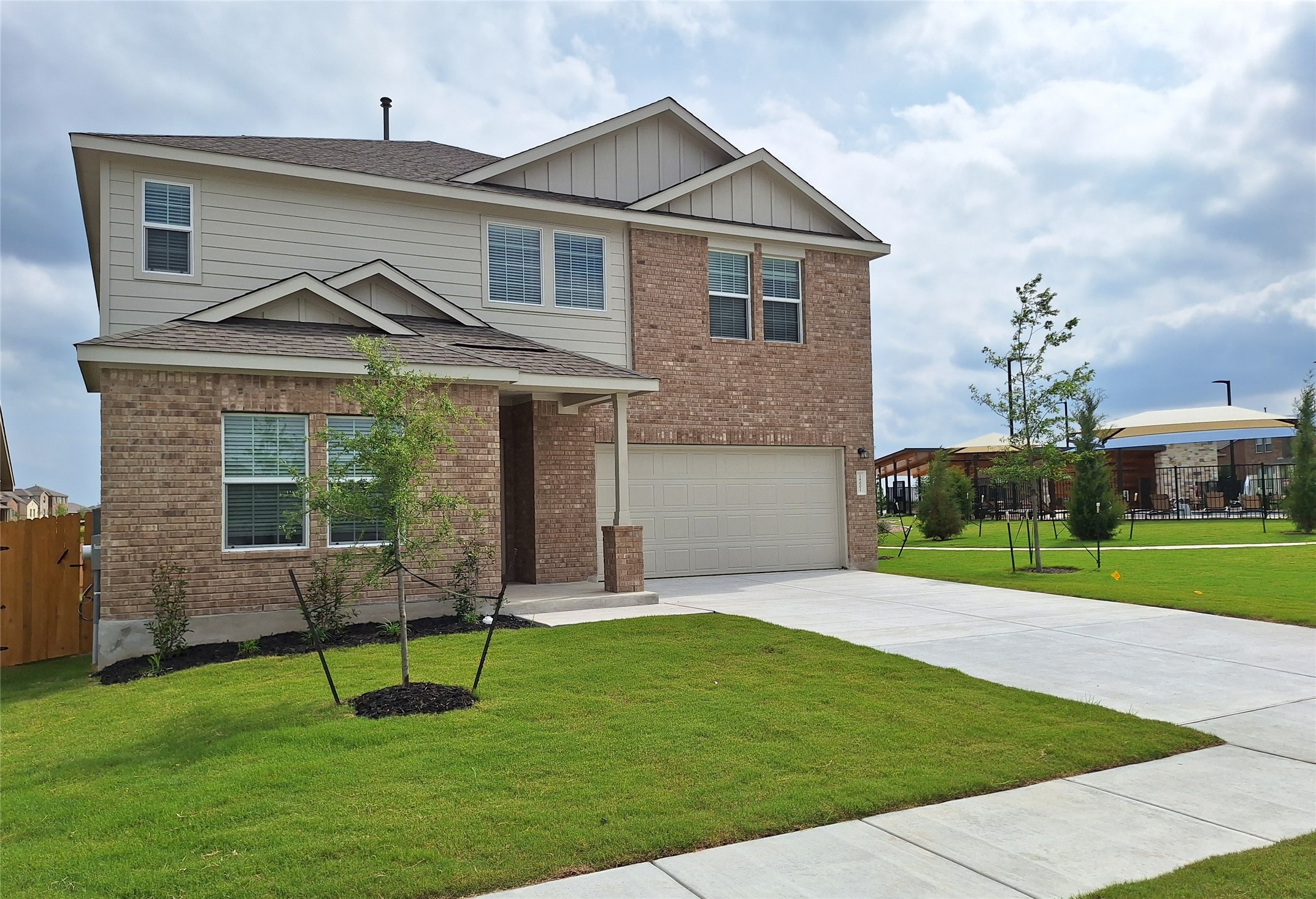 18001 Prairie Falcon Way Pflugerville, TX 78660 - Photo 1 of 38 Brick and siding facade with attached garage
