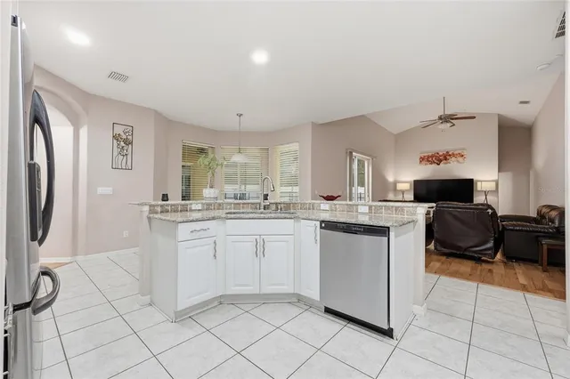 a bed room with a bed and a window