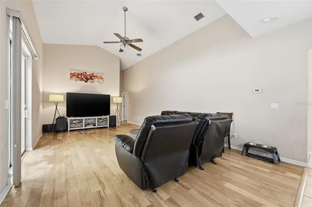 a view of a swimming pool with a patio