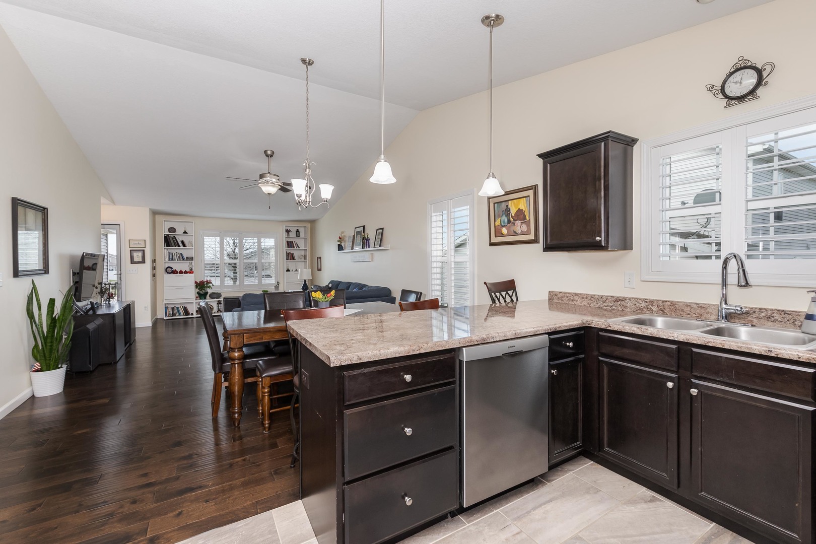 212 Springdale Avenue Bloomington, IL 61704 - Photo 13 of 37 a kitchen with lots of counter space a sink and appliances