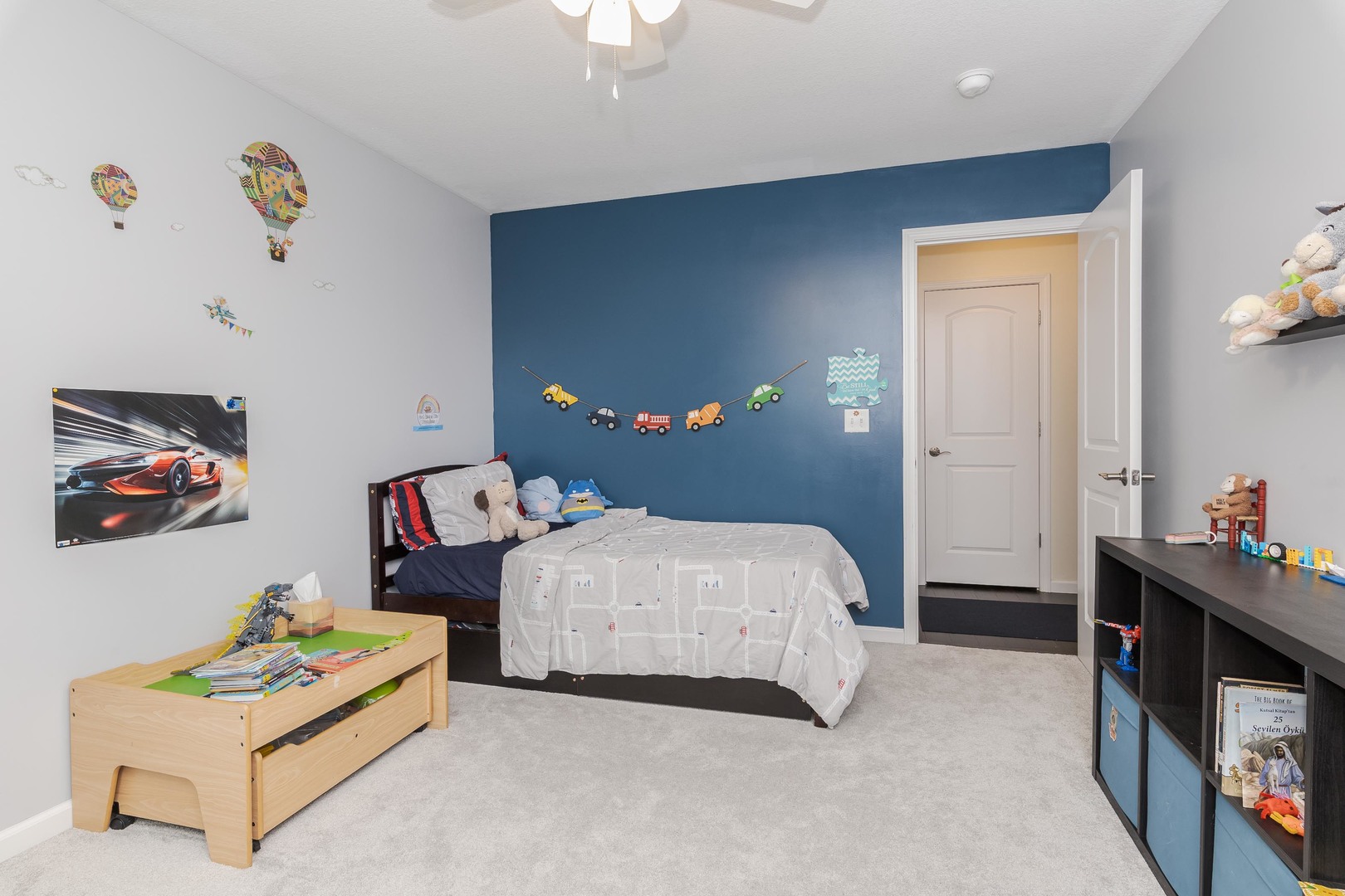 212 Springdale Avenue Bloomington, IL 61704 - Photo 19 of 37 a bedroom with a bed and a chandelier