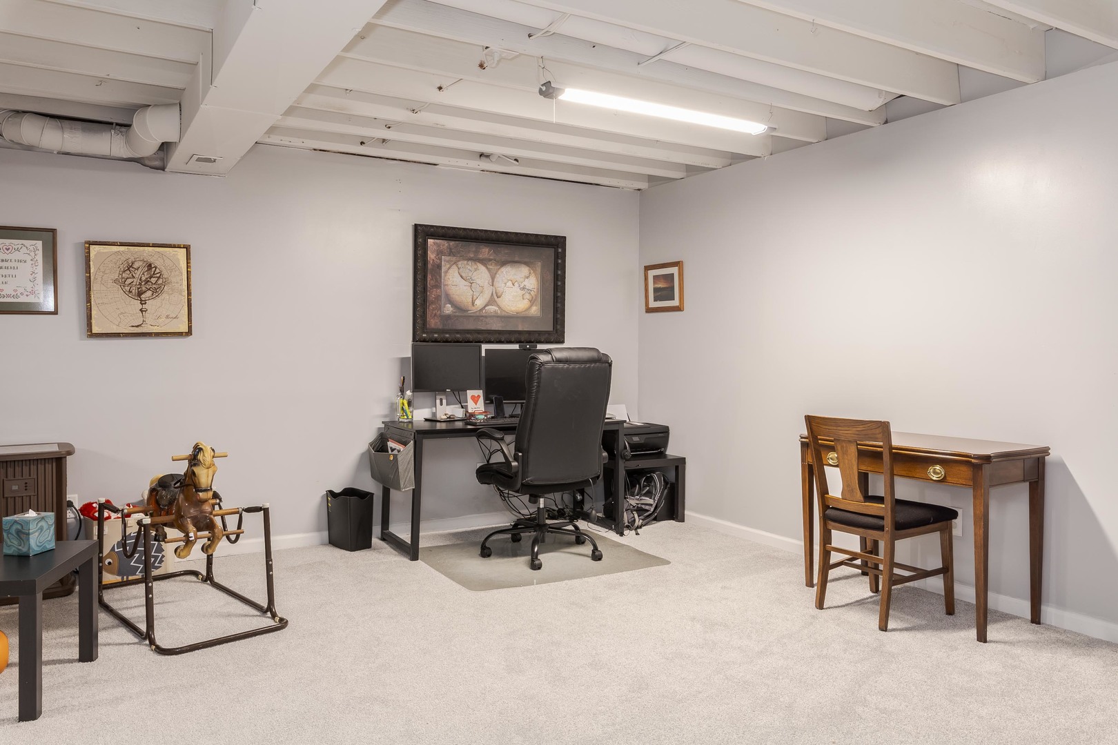 212 Springdale Avenue Bloomington, IL 61704 - Photo 25 of 37 a work room with furniture and a window