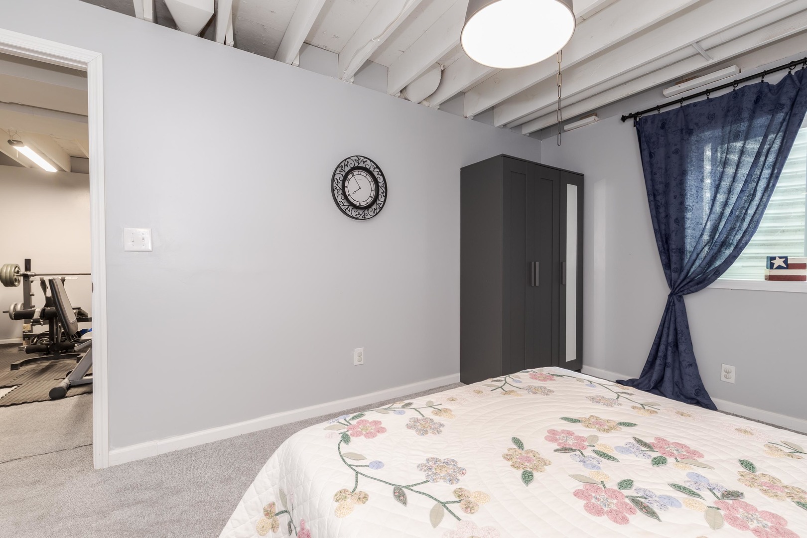 212 Springdale Avenue Bloomington, IL 61704 - Photo 28 of 37 a bedroom with a bed and a chair