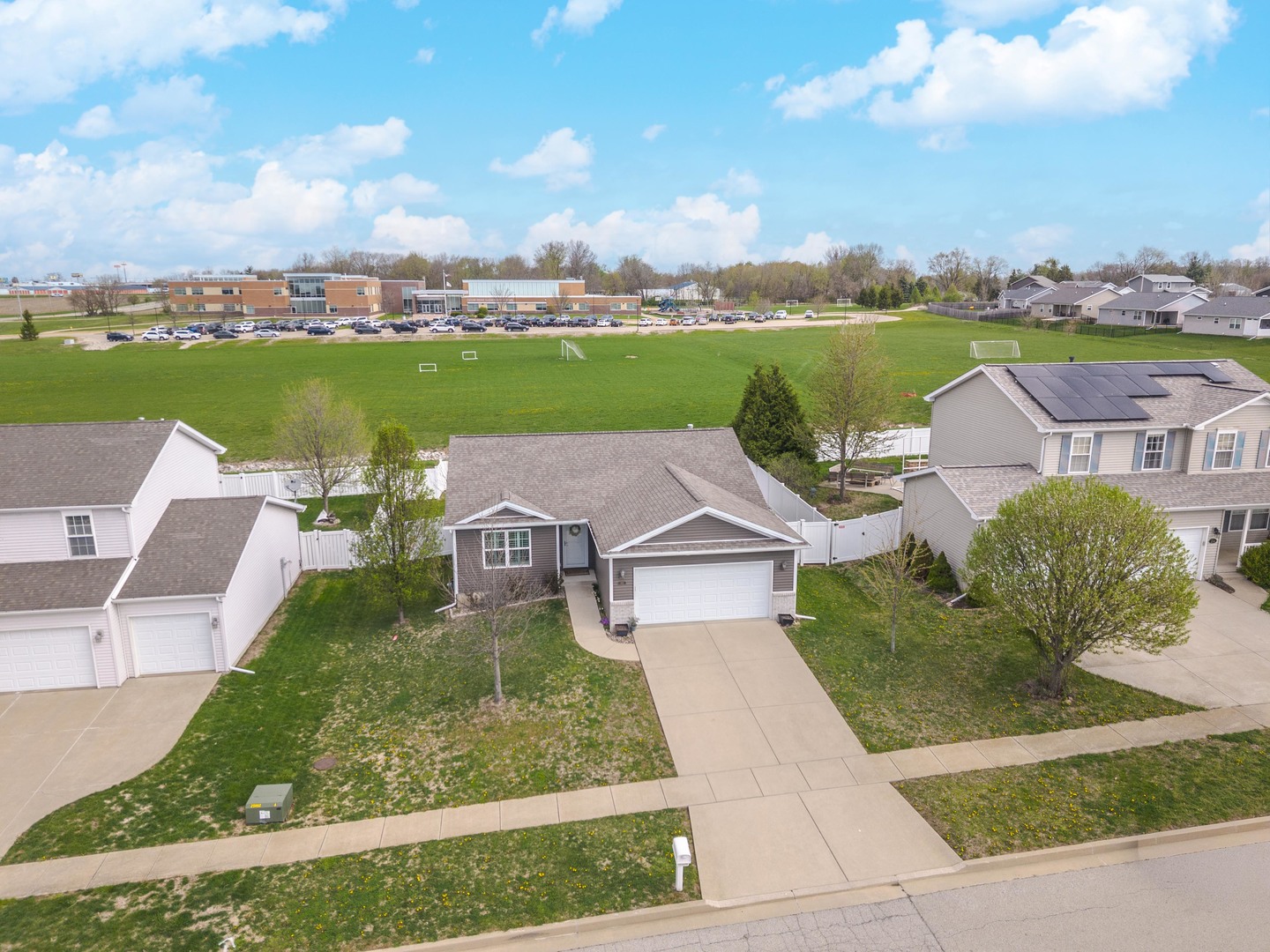 212 Springdale Avenue Bloomington, IL 61704 - Photo 34 of 37 an aerial view of a house with big yard and large tree