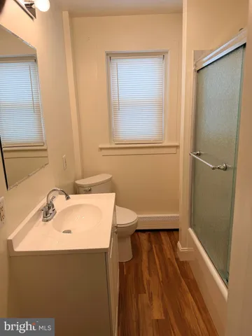 a bathroom with a sink and a shower