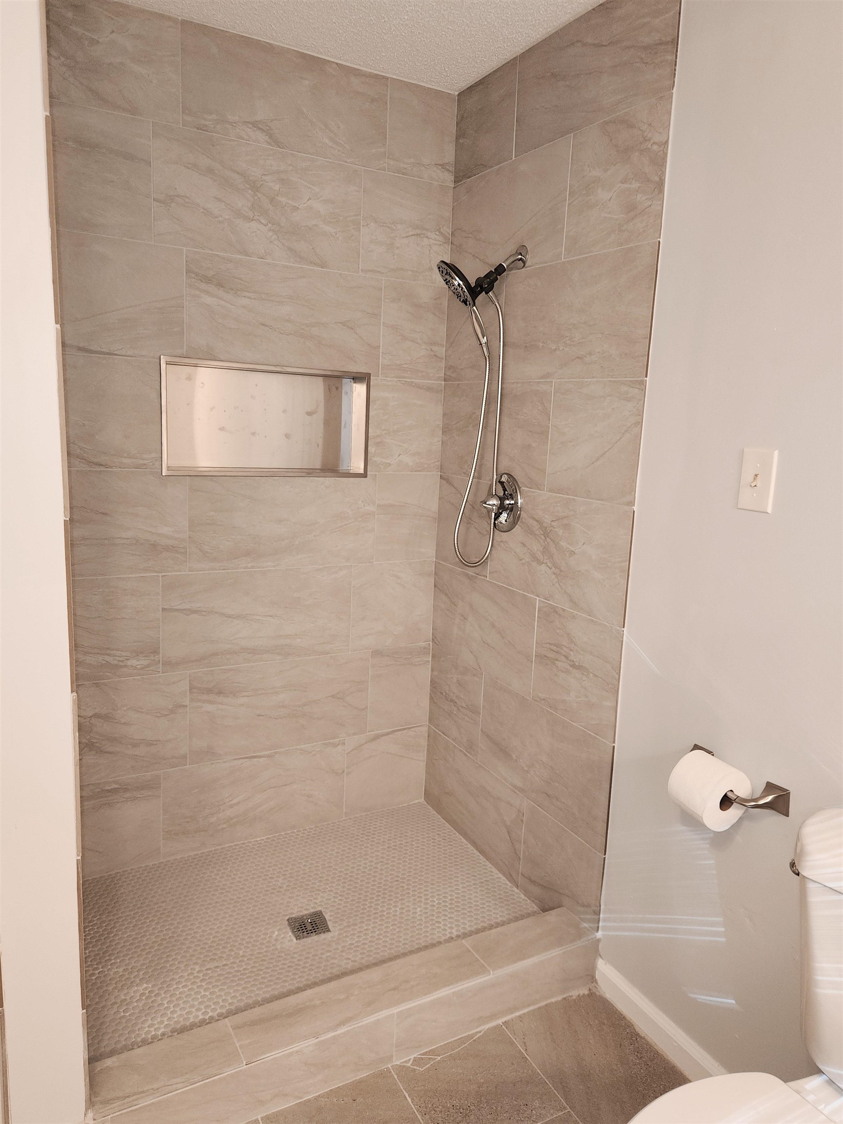 7188 Pleasant Ridge Road Arlington, TN 38002 - Photo 20 of 28 a bathroom with a shower