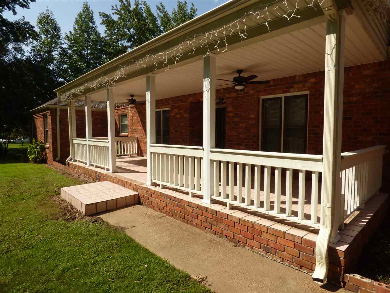 7188 Pleasant Ridge Road Arlington, TN 38002 - Photo 2 of 28 a view of a house with backyard and porch