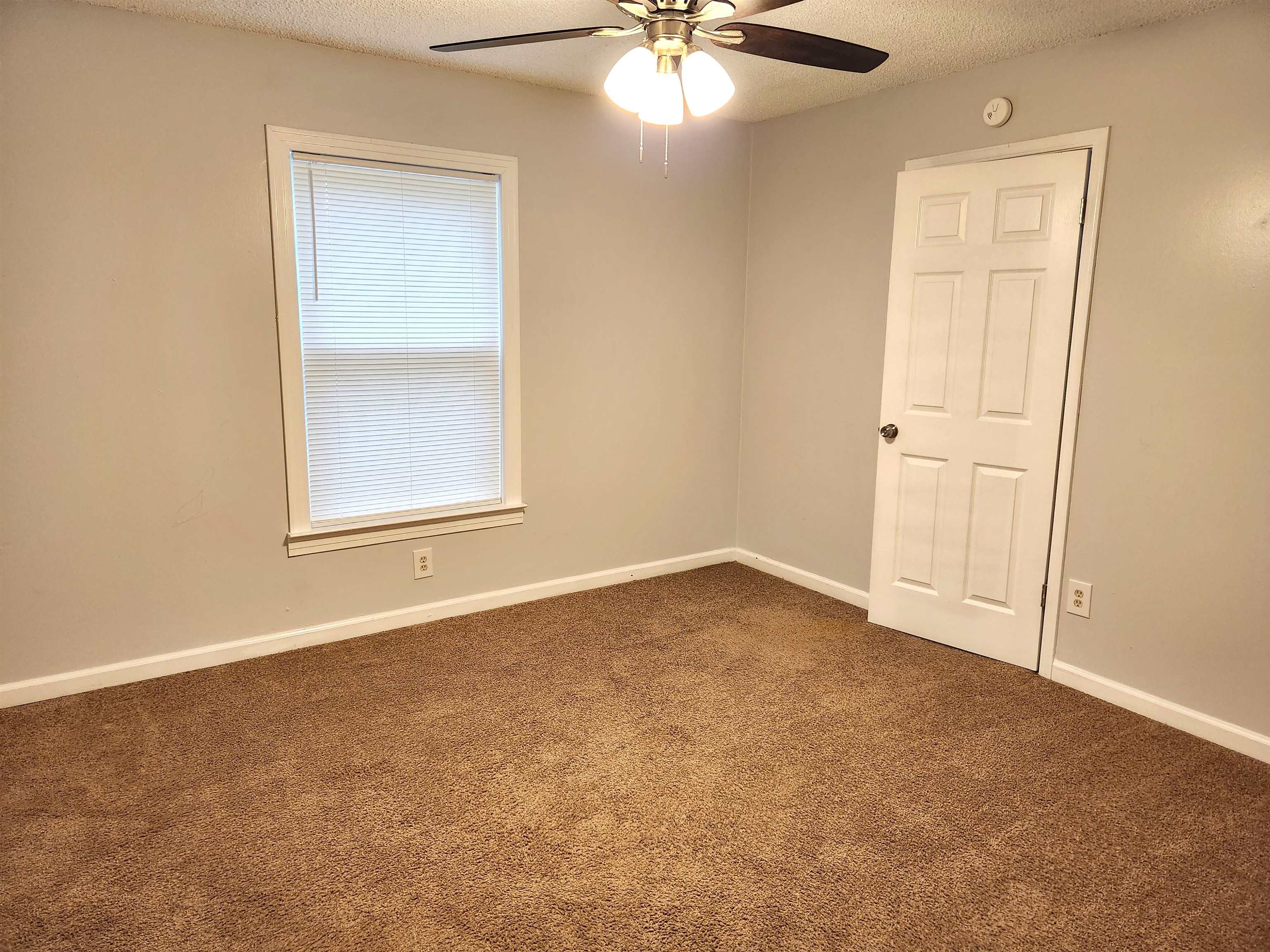 7188 Pleasant Ridge Road Arlington, TN 38002 - Photo 21 of 28 an empty room with a window