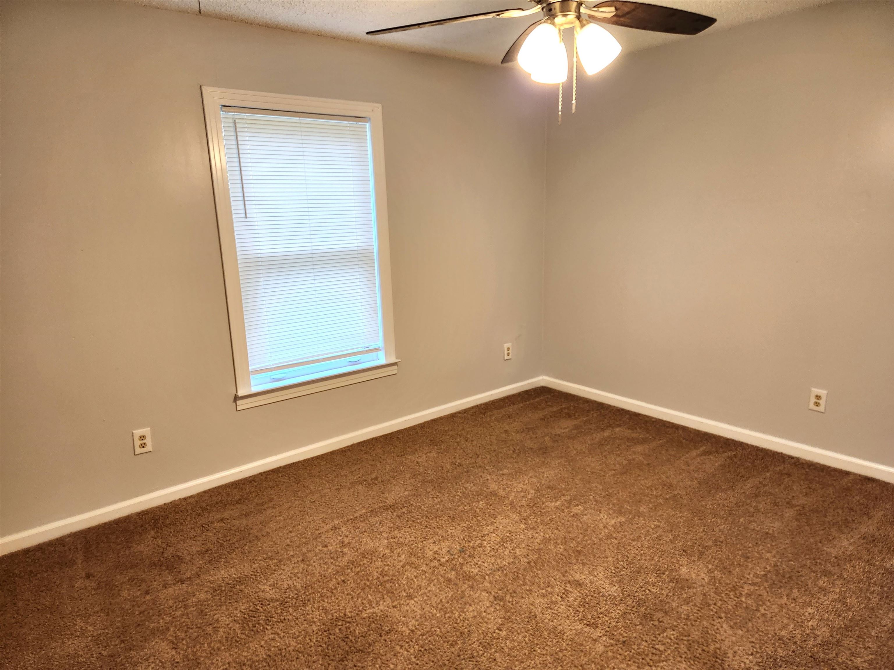 7188 Pleasant Ridge Road Arlington, TN 38002 - Photo 22 of 28 an empty room with a window