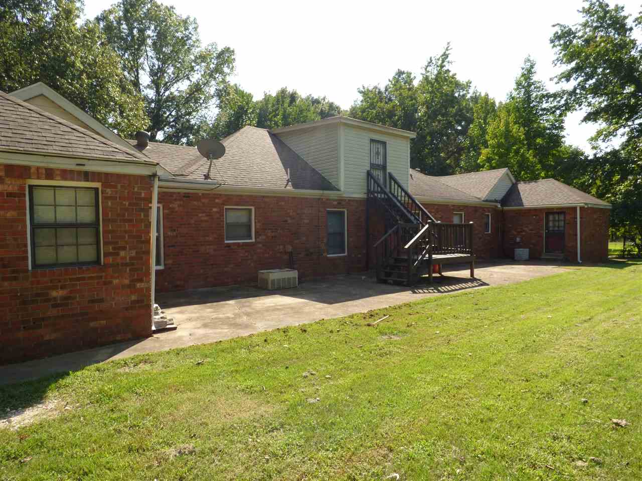 7188 Pleasant Ridge Road Arlington, TN 38002 - Photo 26 of 28 a view of a house with a yard