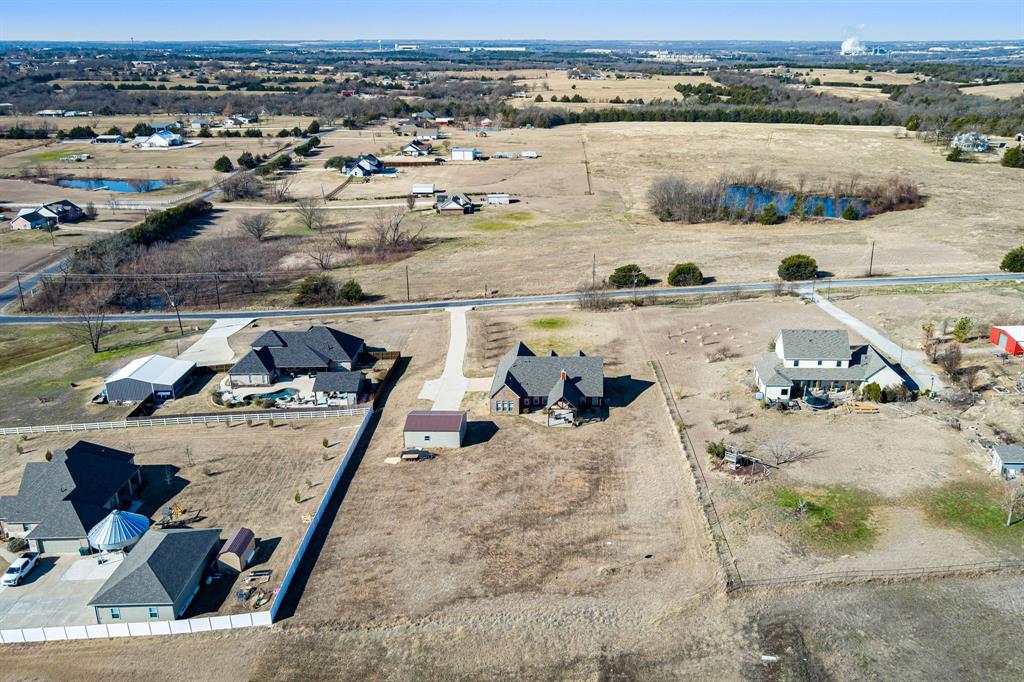 3028 Harrell Road Howe, TX 75459 - Photo 35 of 39 an aerial view of a house with a lake view