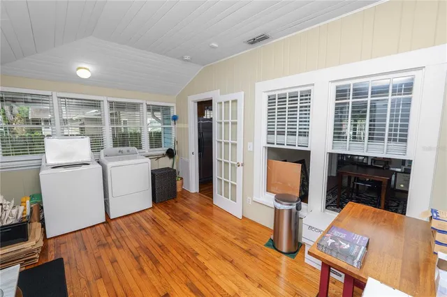 a view of a living room and dining room