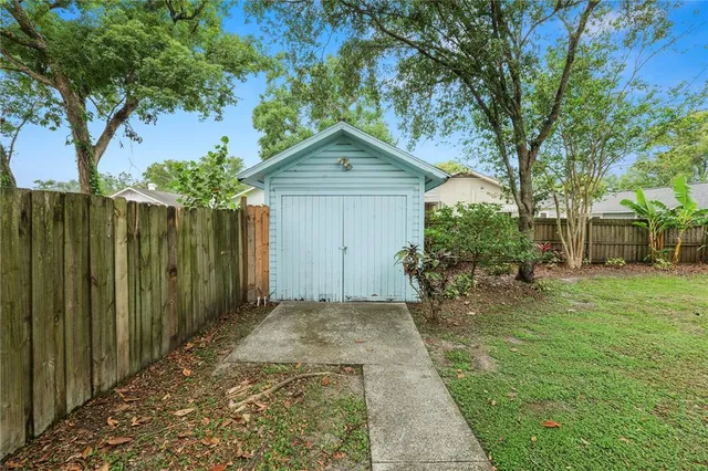 a backyard of a house with seating space