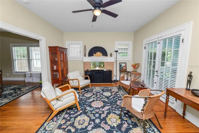 a living room with furniture and a window