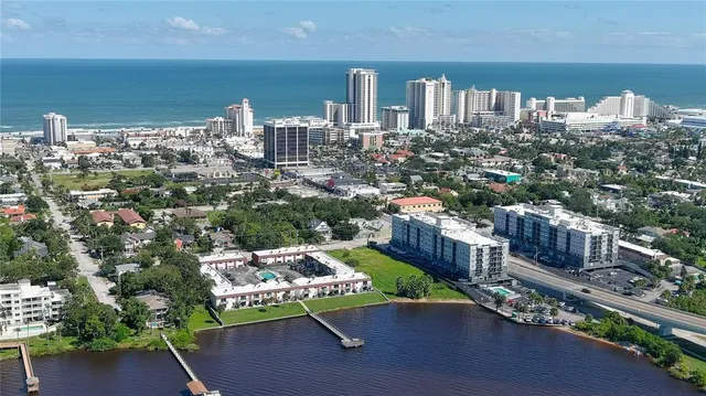 an aerial view of a house with a garden