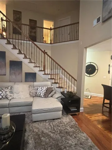 a kitchen with granite countertop wooden cabinets and a sink