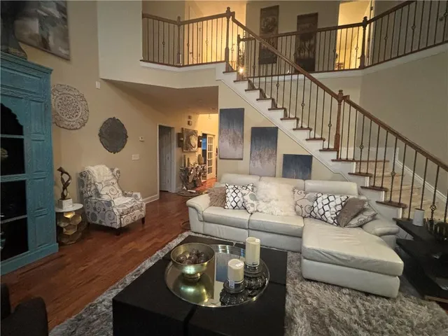 a kitchen with granite countertop wooden cabinets