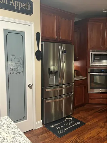 a view of living room with wooden floor