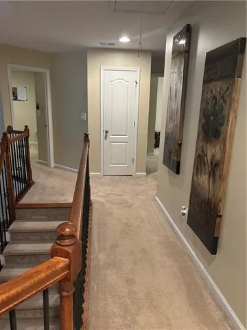 a bathroom with a sink vanity and a mirror