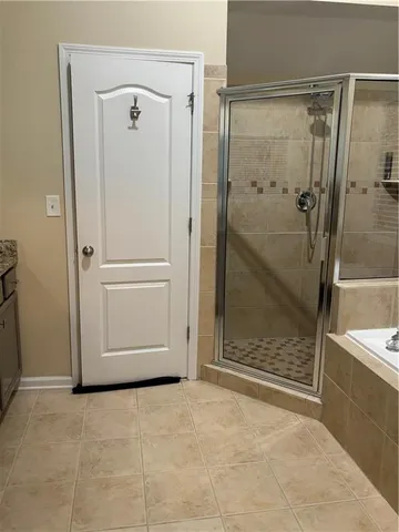 a living room with couch and a window