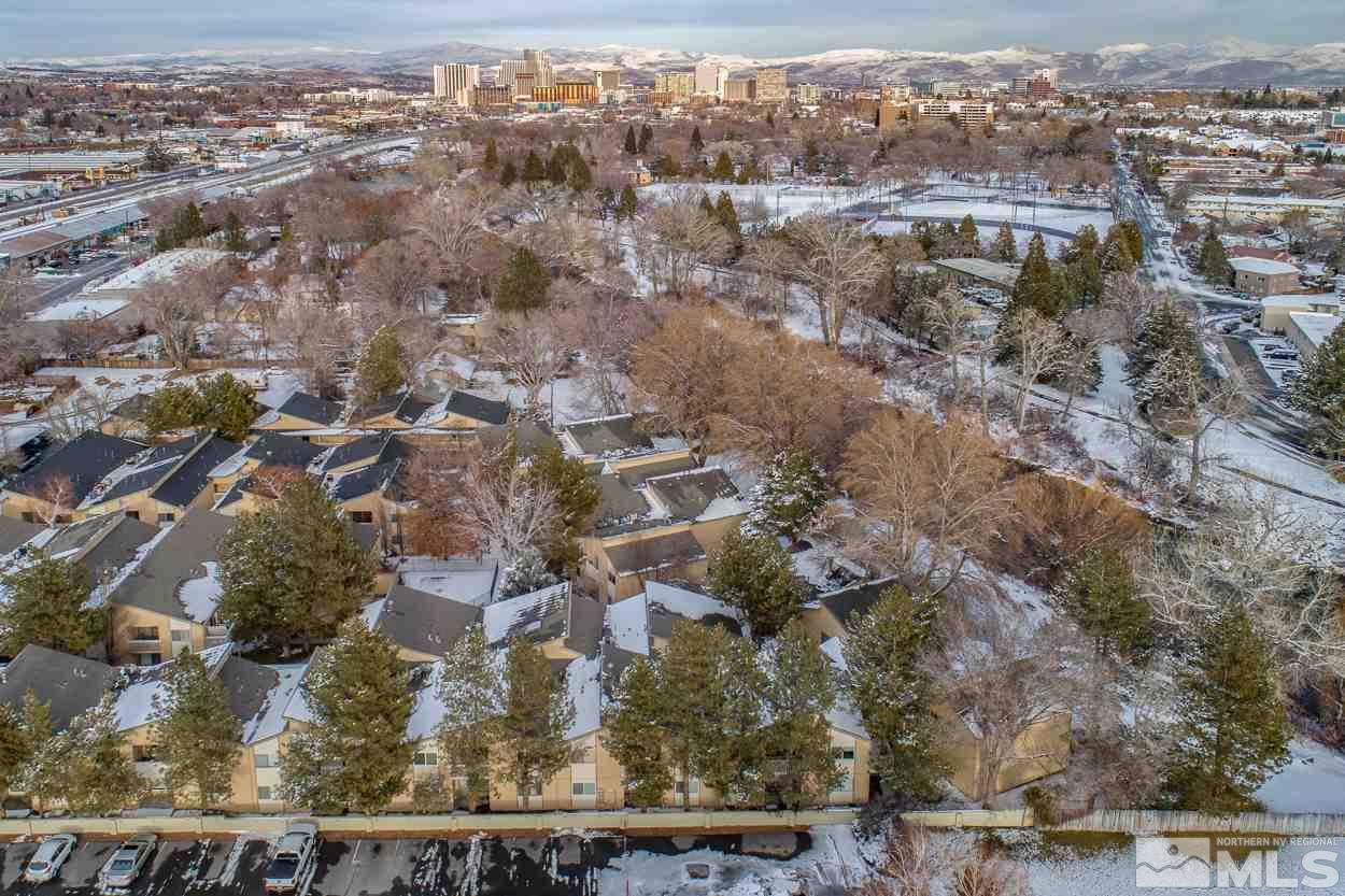 2300 Dickerson Road, Unit 65 Reno, NV 89503 - Photo 1 of 9 an aerial view of residential houses with city view