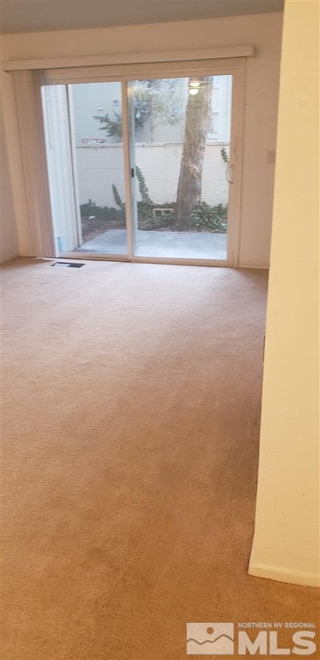 2300 Dickerson Road, Unit 65 Reno, NV 89503 - Photo 8 of 9 a view of wooden floor and a window