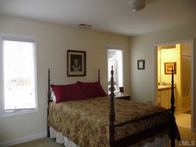 609 Leonidas Court Raleigh, NC 27604 - Photo 11 of 25 The middle bedroom opens to the large 2nd bath that is also Universal design.