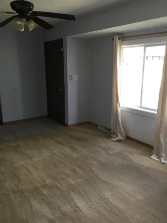 an empty room with windows