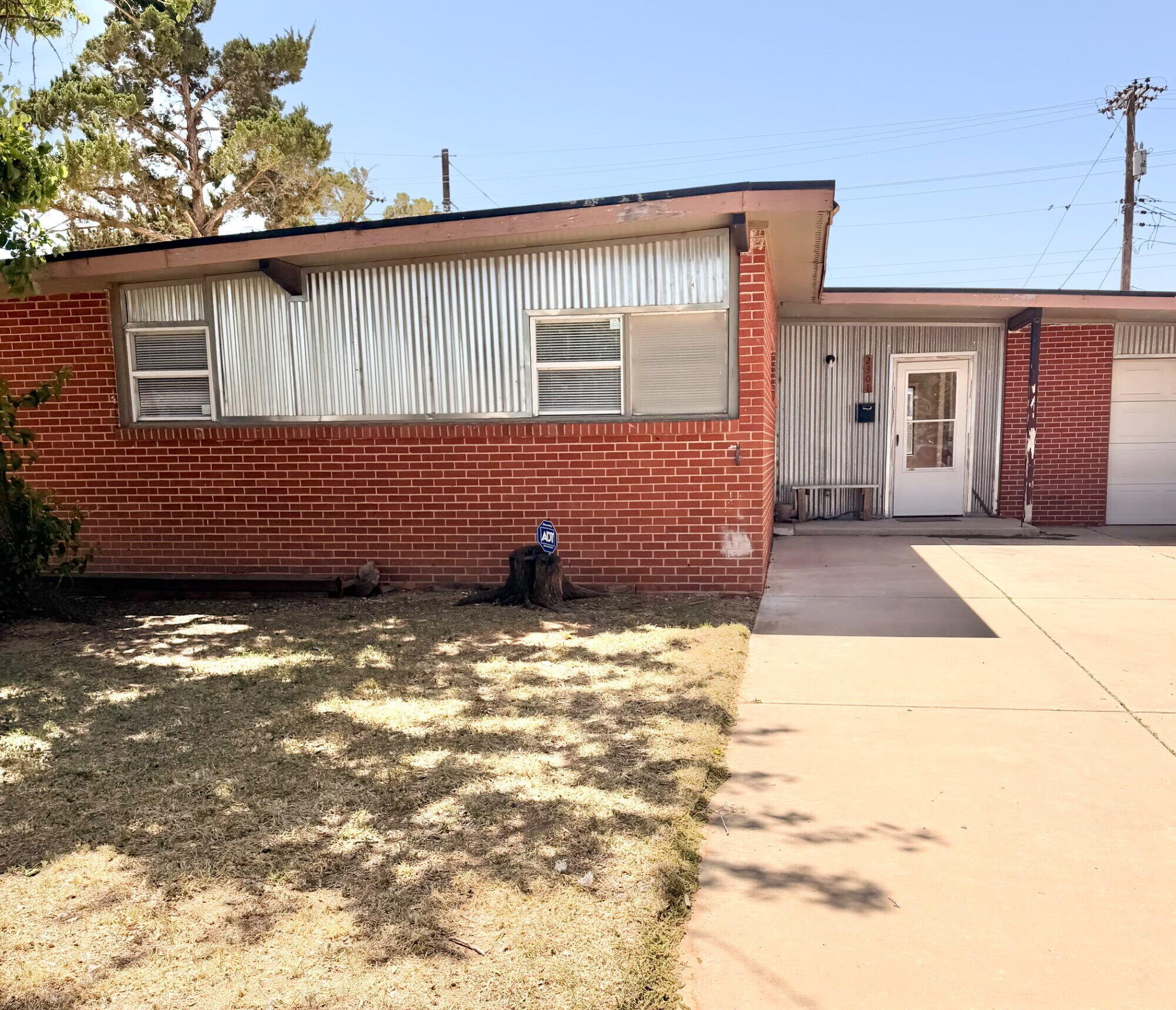2301 49th Street Lubbock, TX 79412 - Photo 1 of 18 a backyard of a house