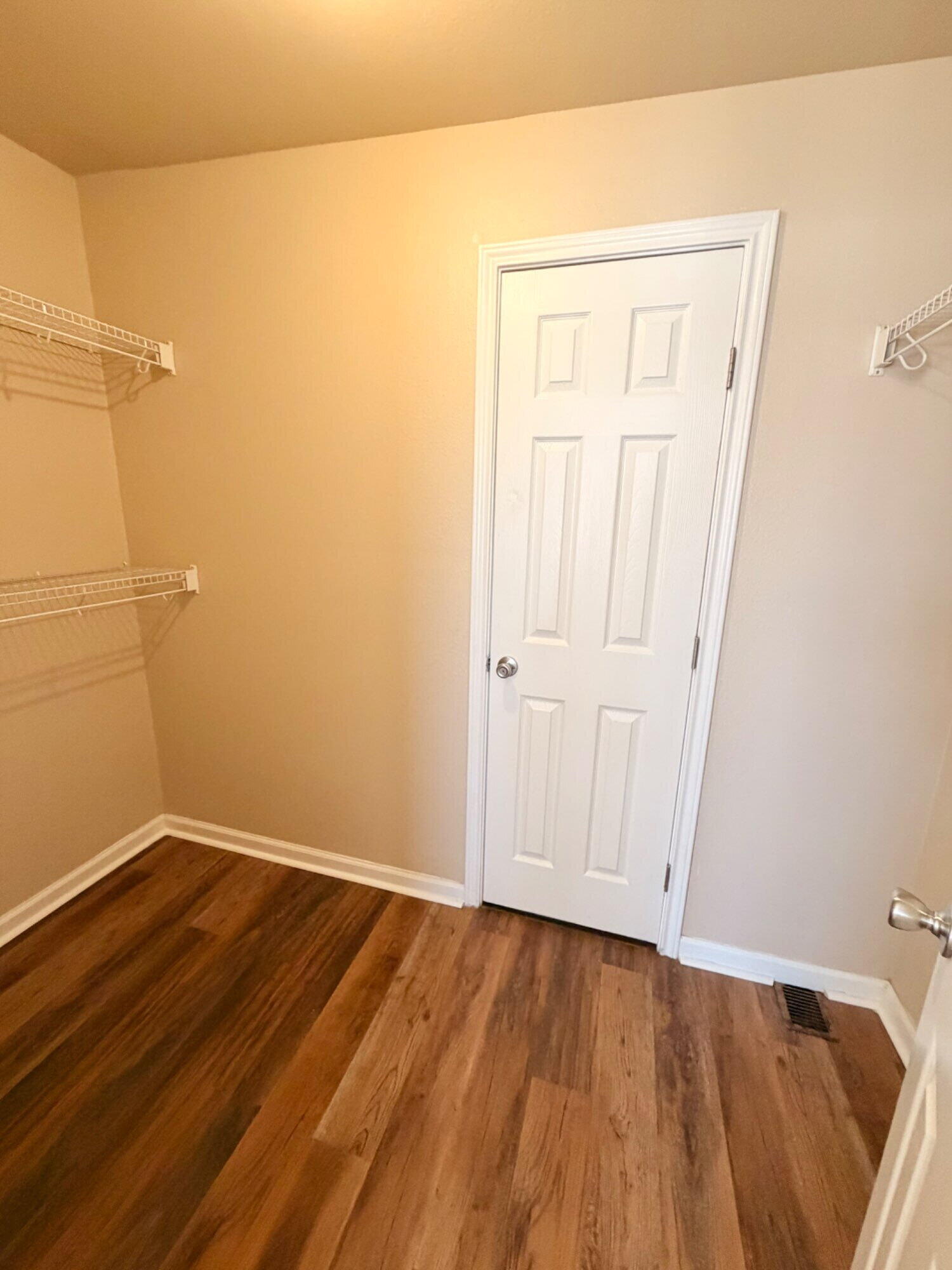 2301 49th Street Lubbock, TX 79412 - Photo 15 of 18 a view of a room with wooden floor