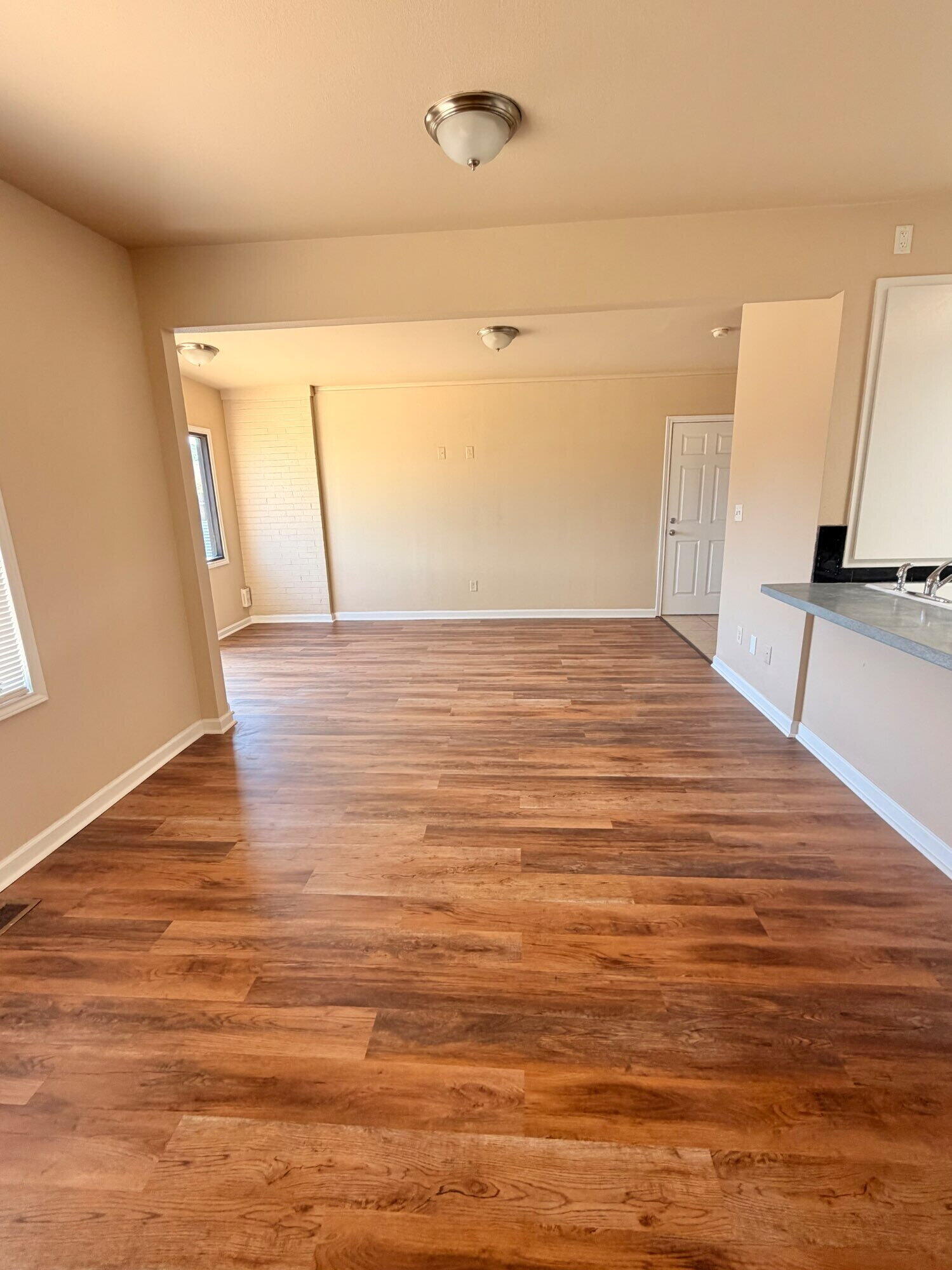 2301 49th Street Lubbock, TX 79412 - Photo 3 of 18 a view of a room with wooden floor