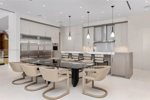 a lobby with furniture and floor to ceiling window