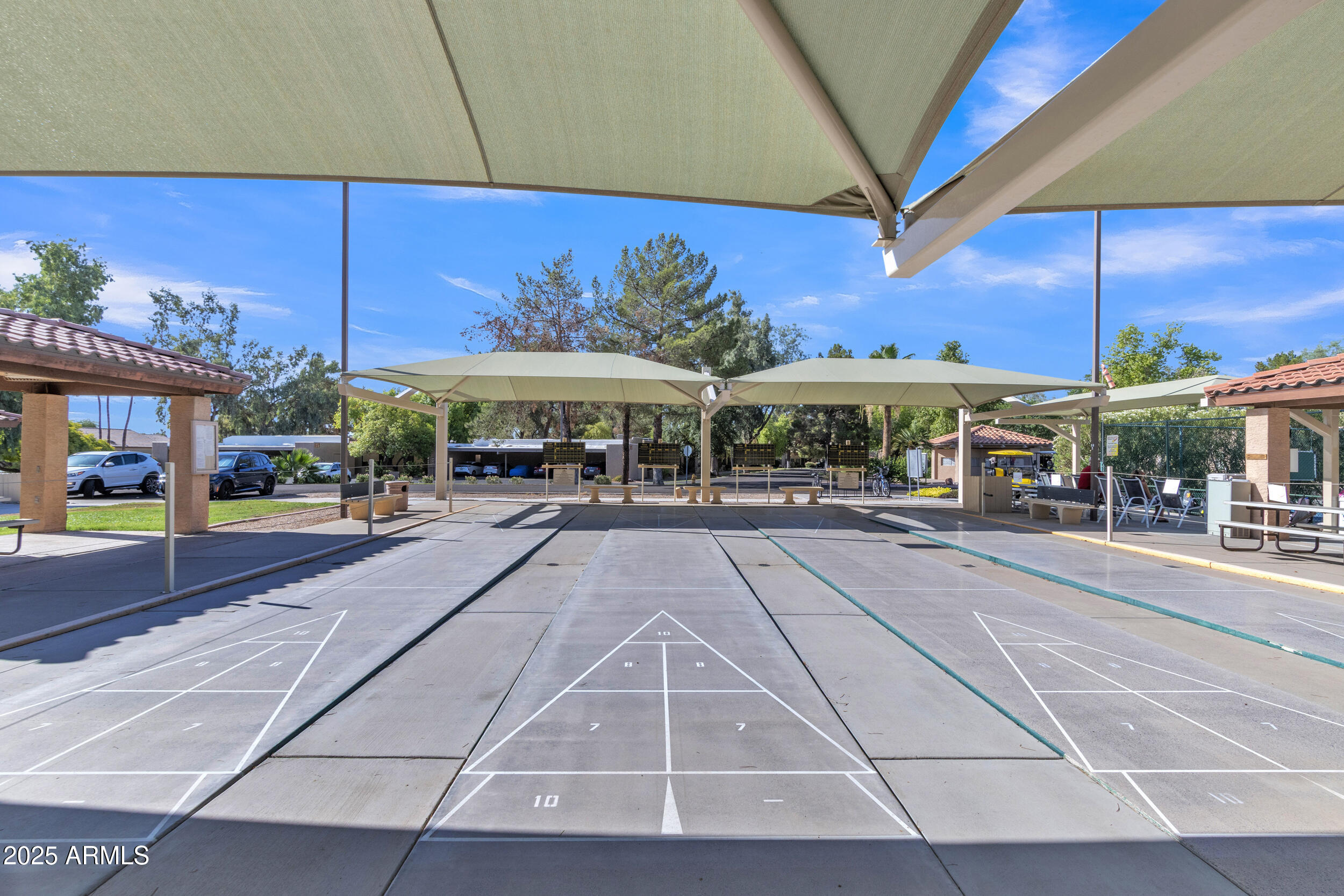 14300 West Bell Road, Unit 105 Surprise, AZ 85374 - Photo 20 of 45 a view of a building with sitting area
