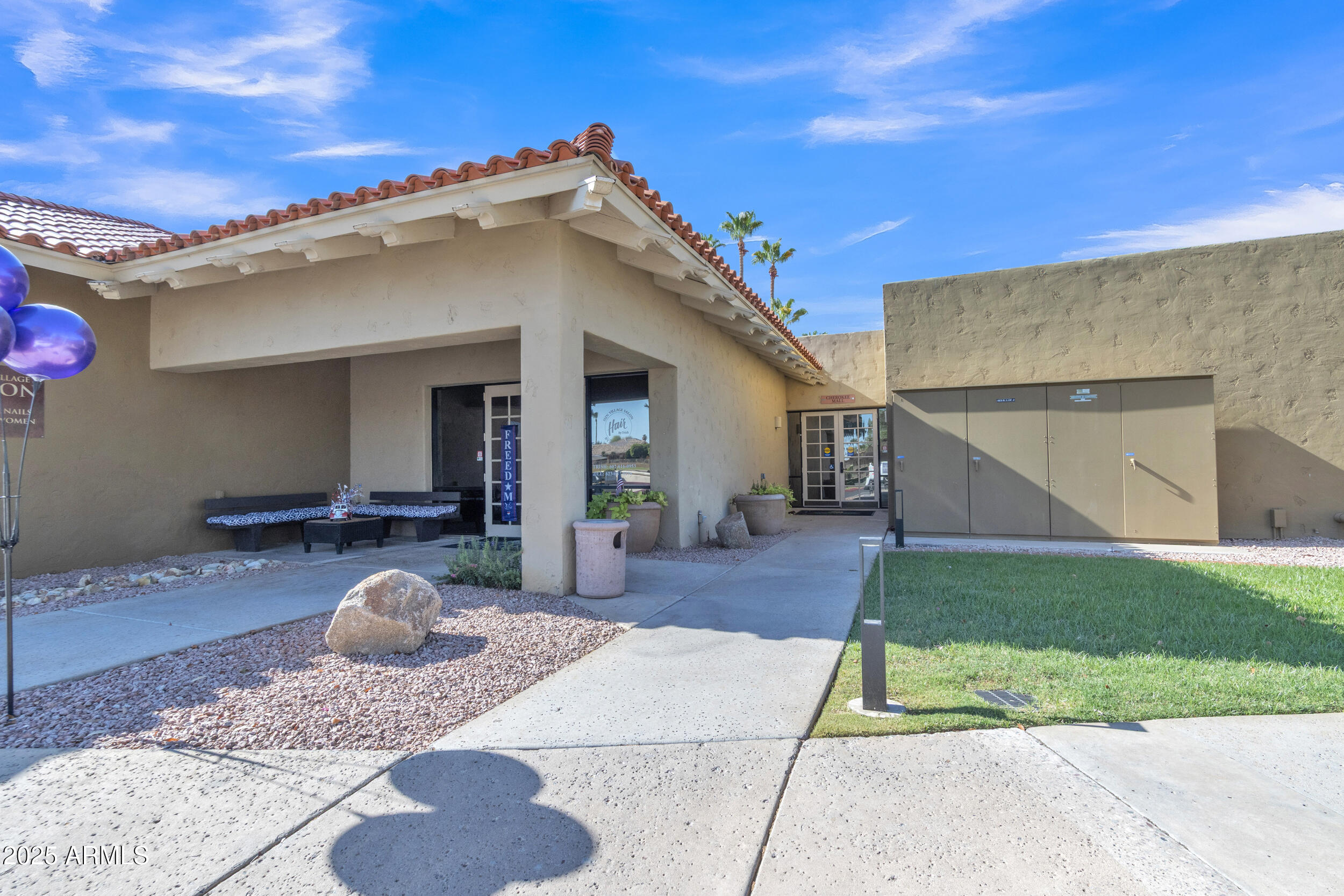 14300 West Bell Road, Unit 105 Surprise, AZ 85374 - Photo 23 of 45 a view of a house with backyard and porch
