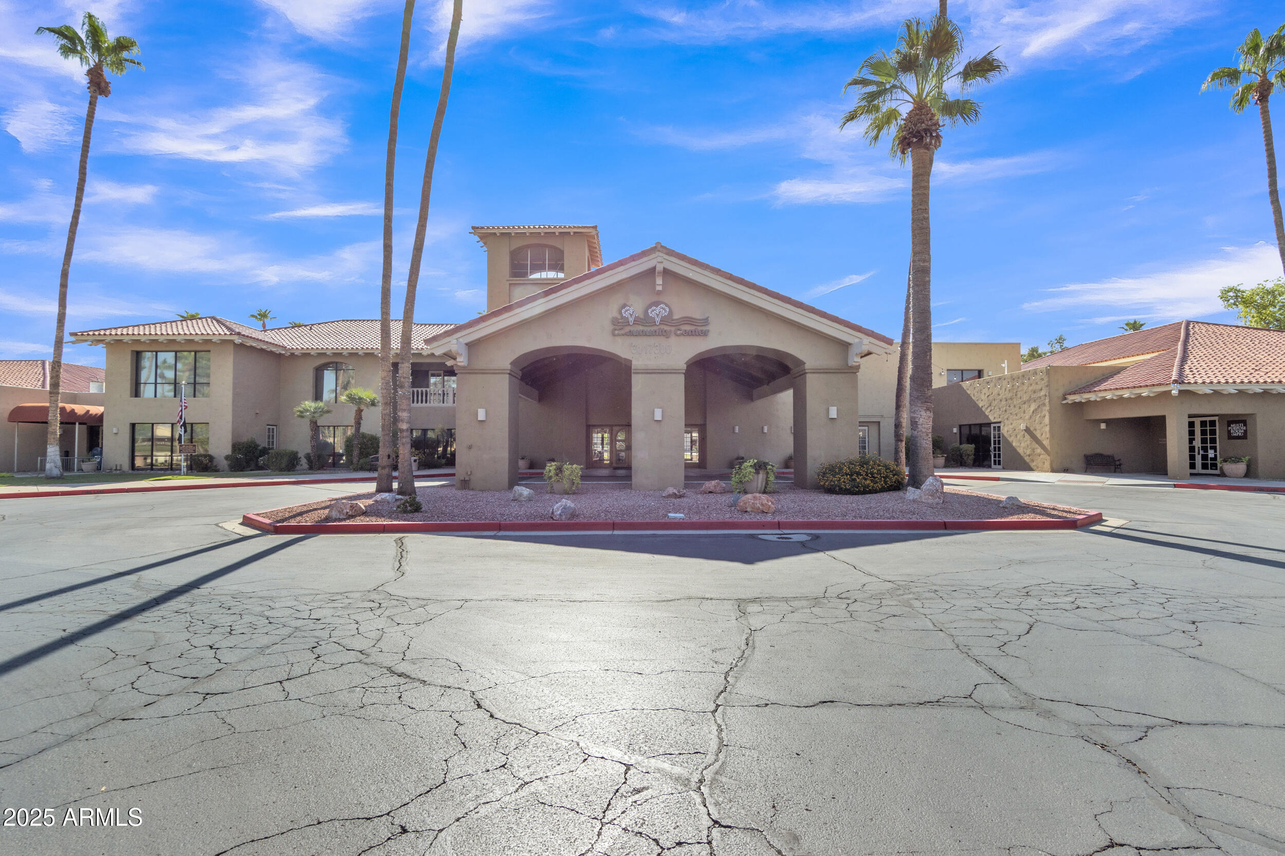 14300 West Bell Road, Unit 105 Surprise, AZ 85374 - Photo 24 of 45 a view of a building with a pathway