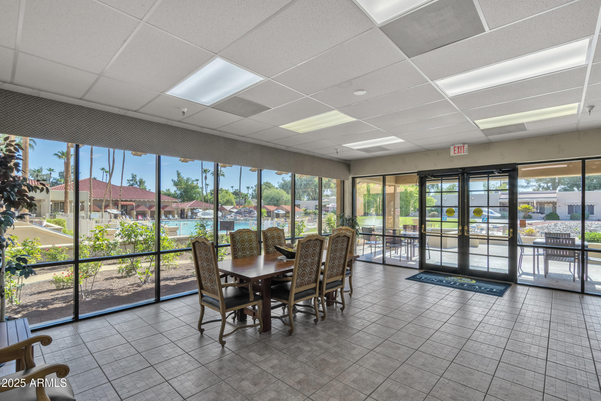 14300 West Bell Road, Unit 105 Surprise, AZ 85374 - Photo 29 of 45 a view of a dining room with furniture window and outside view