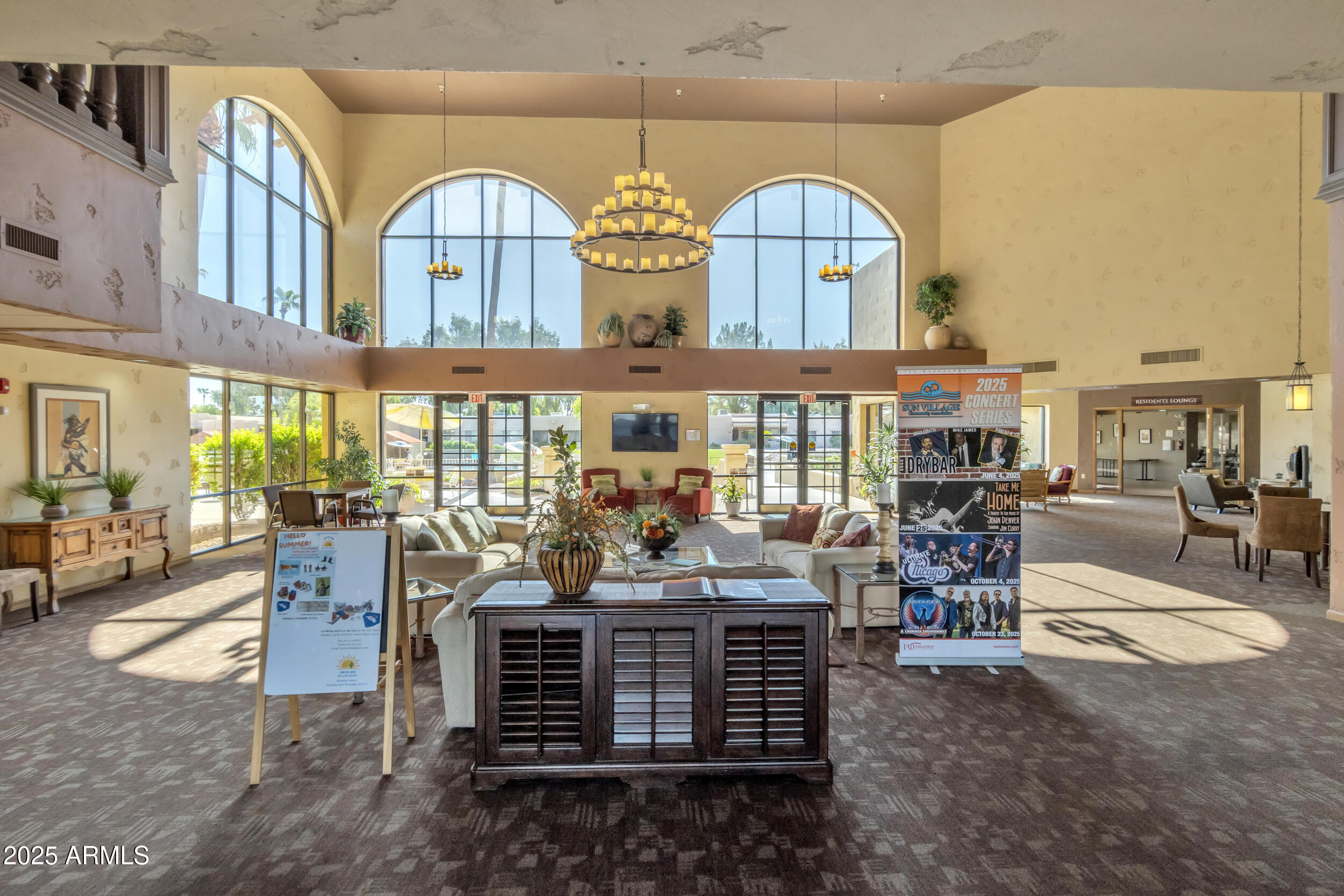 14300 West Bell Road, Unit 105 Surprise, AZ 85374 - Photo 32 of 45 a view of building with outdoor seating space