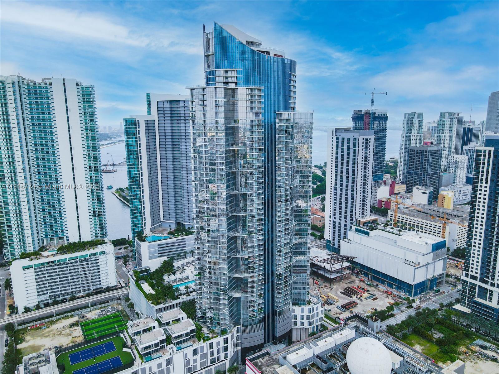 851 Northeast 1st Avenue, Unit 3202 Miami, FL 33132 - Photo 61 of 68 a view of a city with tall buildings