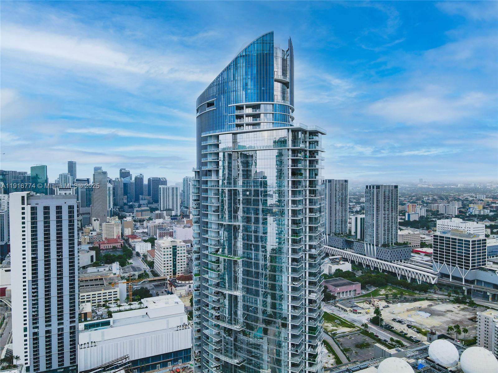 851 Northeast 1st Avenue, Unit 3202 Miami, FL 33132 - Photo 62 of 68 a view of a city with tall buildings