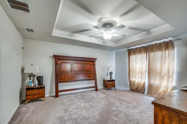 a view of livingroom with hardwood floor and ceiling fan