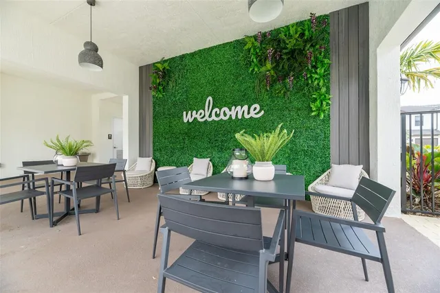 a view of a dining room with furniture window and outside view