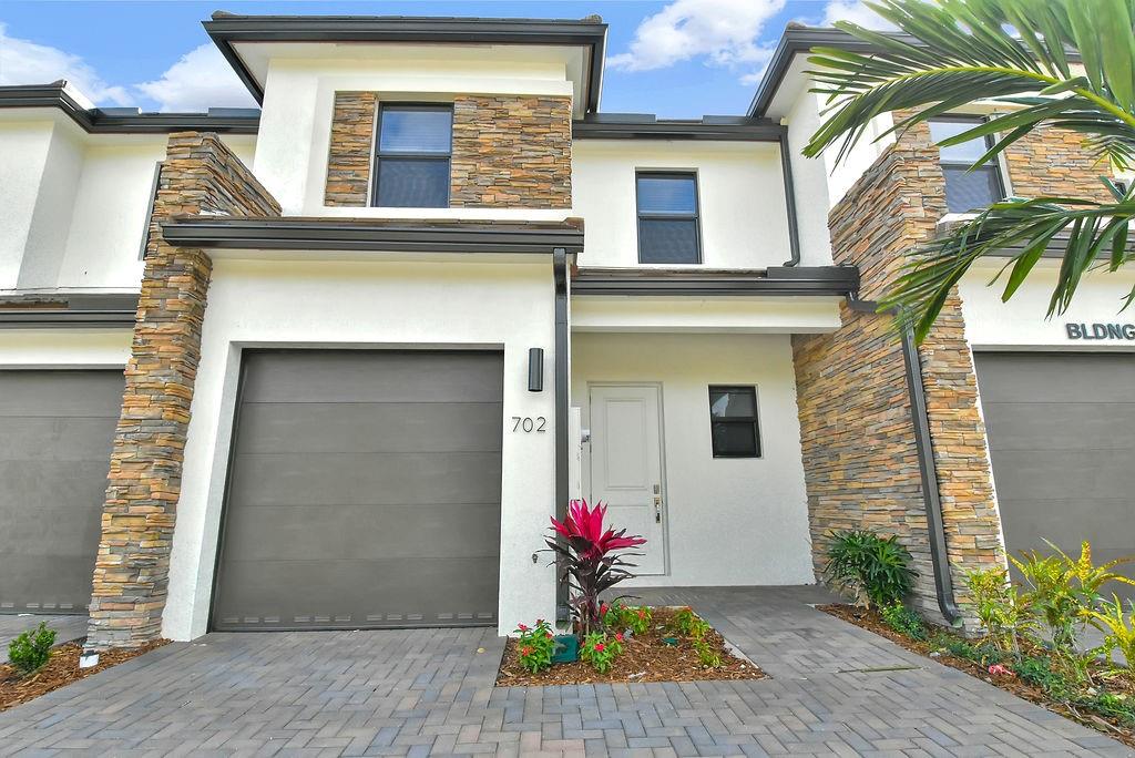 4083 Sunset Way Pompano Beach, FL 33069 - Photo 2 of 34 a front view of a house