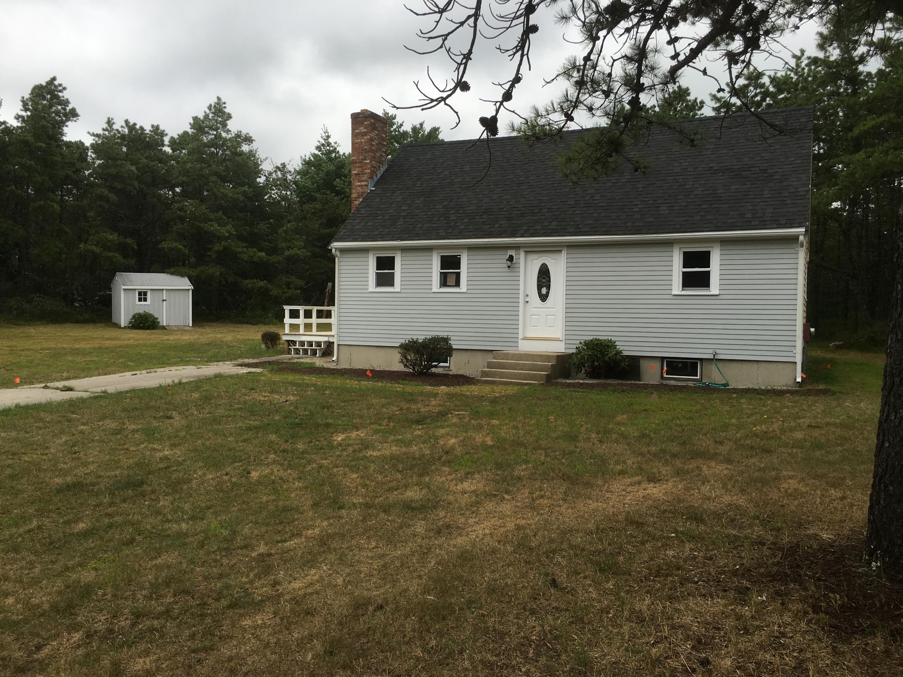 a house view with a garden space