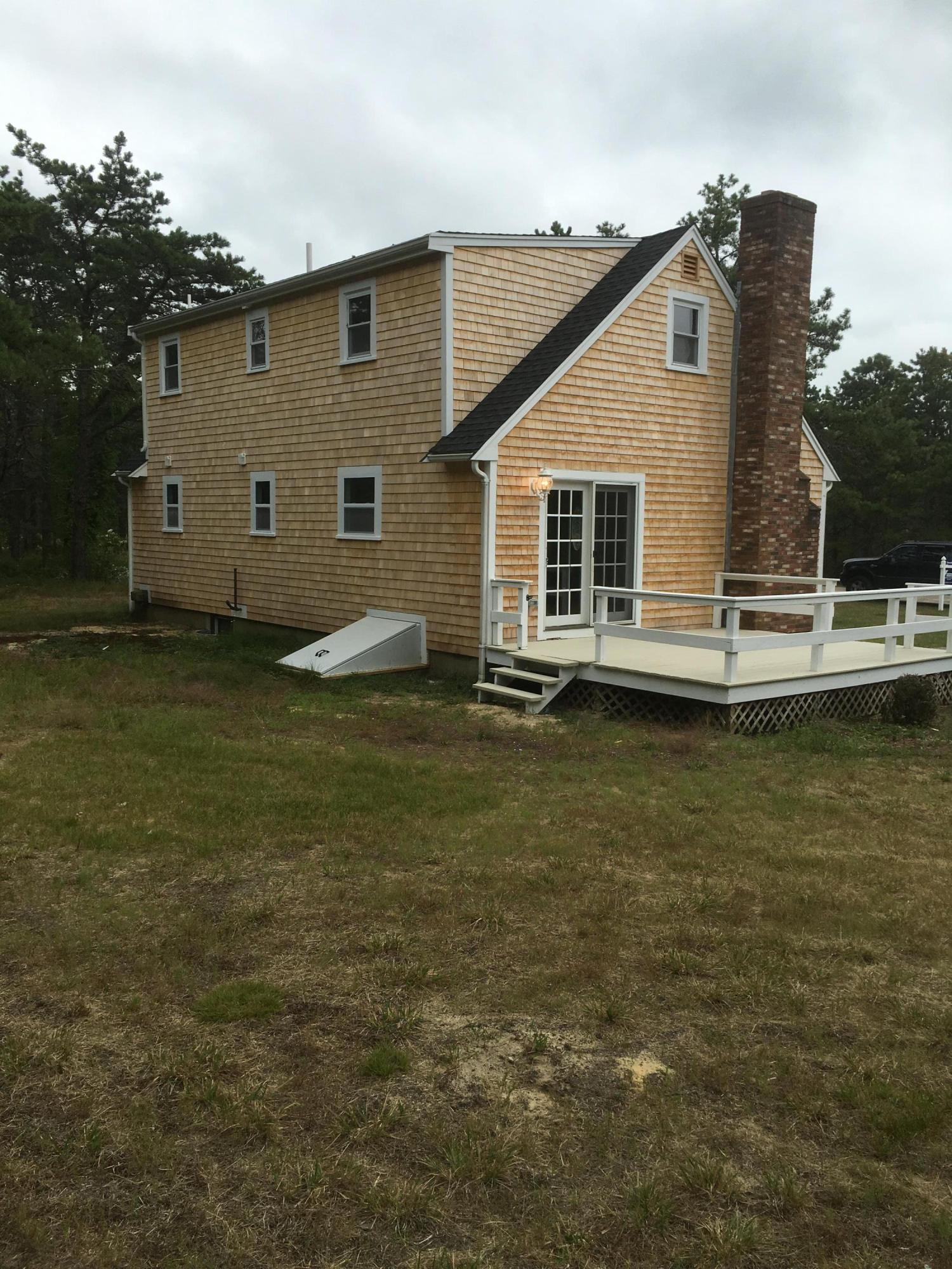 18 Seawood Road Wareham, MA 02571 - Photo 2 of 13 a view of a house with a yard