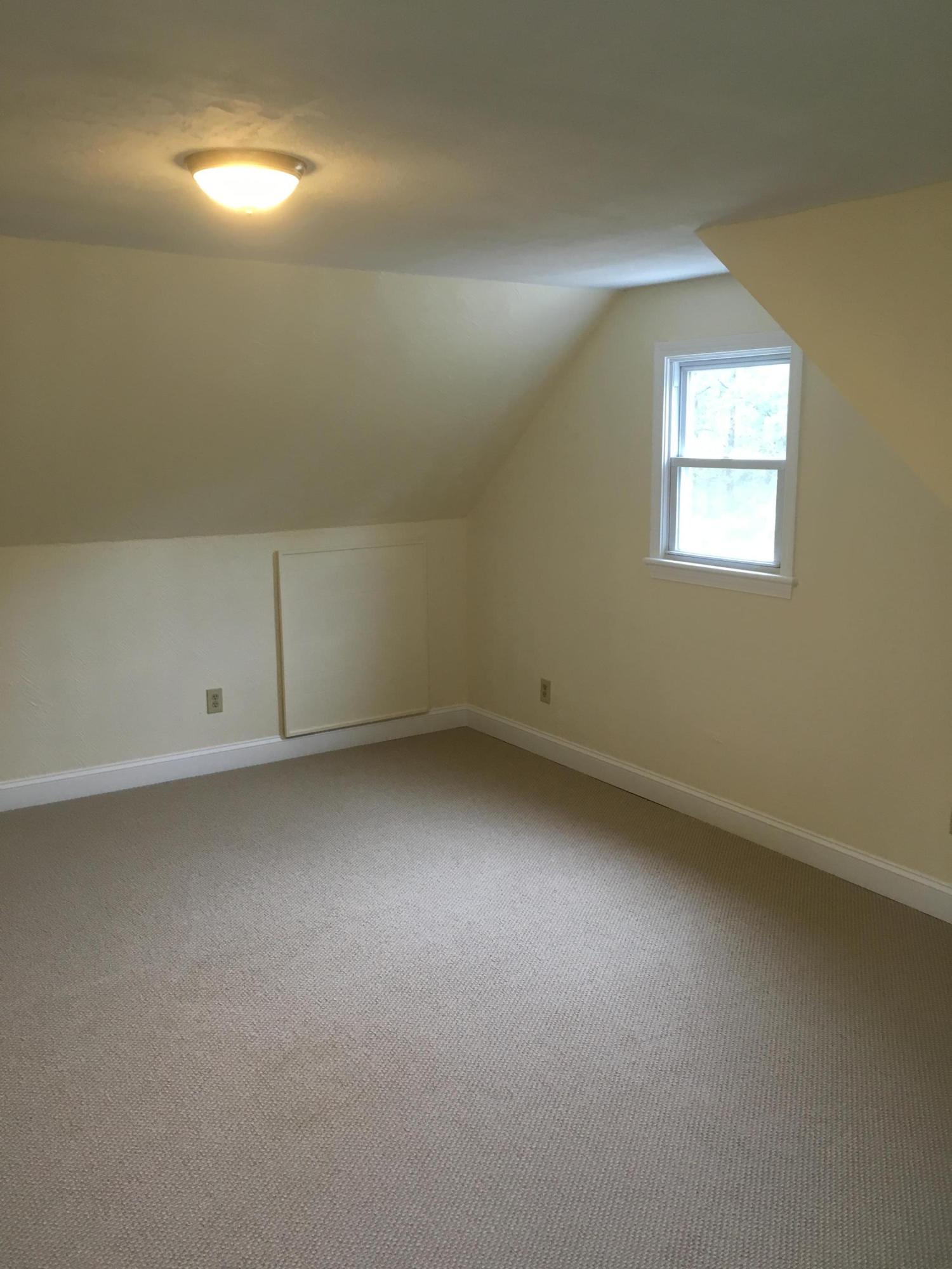18 Seawood Road Wareham, MA 02571 - Photo 10 of 13 an empty room with a window
