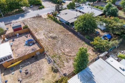 an aerial view of a house with mountain view