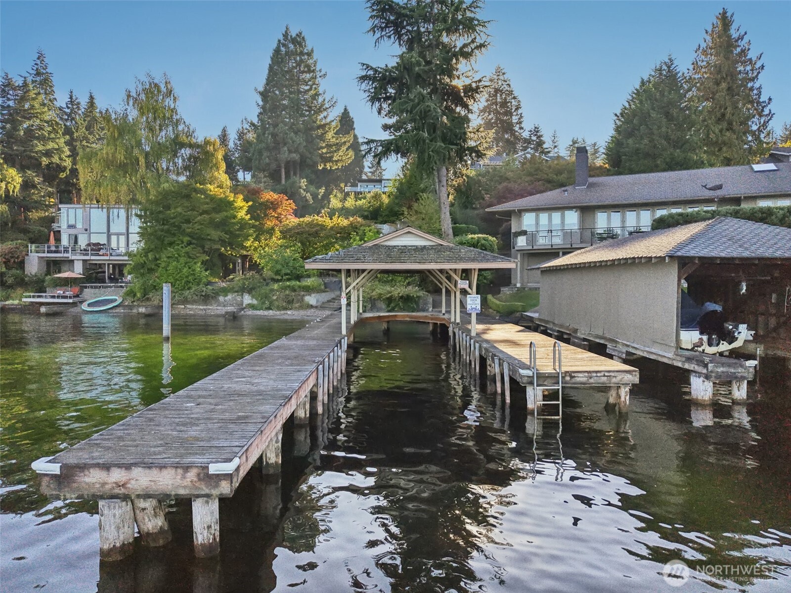 7220 North Mercer Way Mercer Island, WA 98040 - Photo 13 of 19 a view of house with garden space and sitting area