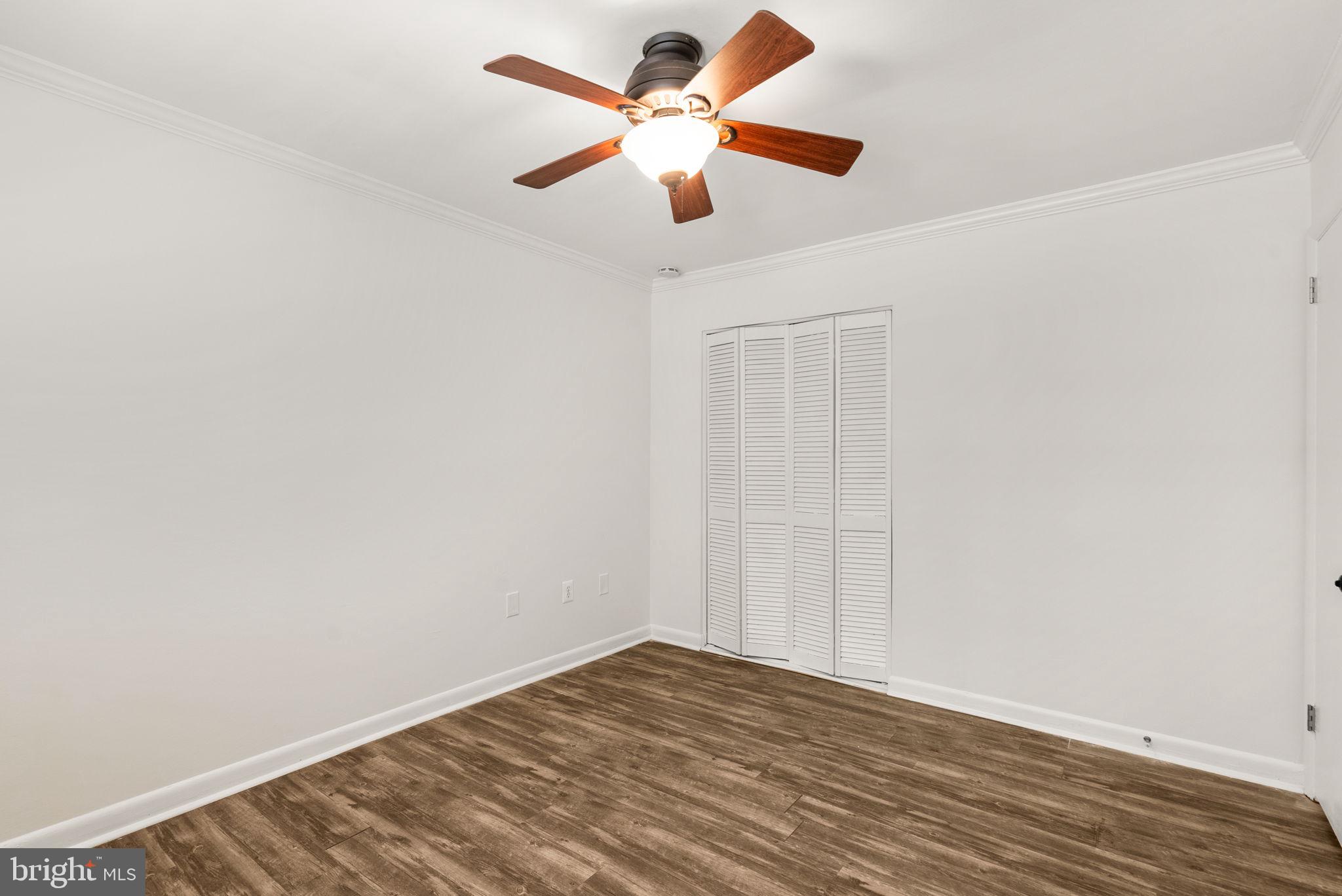 199 Talbott Street, Unit 199 Rockville, MD 20852 - Photo 22 of 31 wooden floor in an empty room
