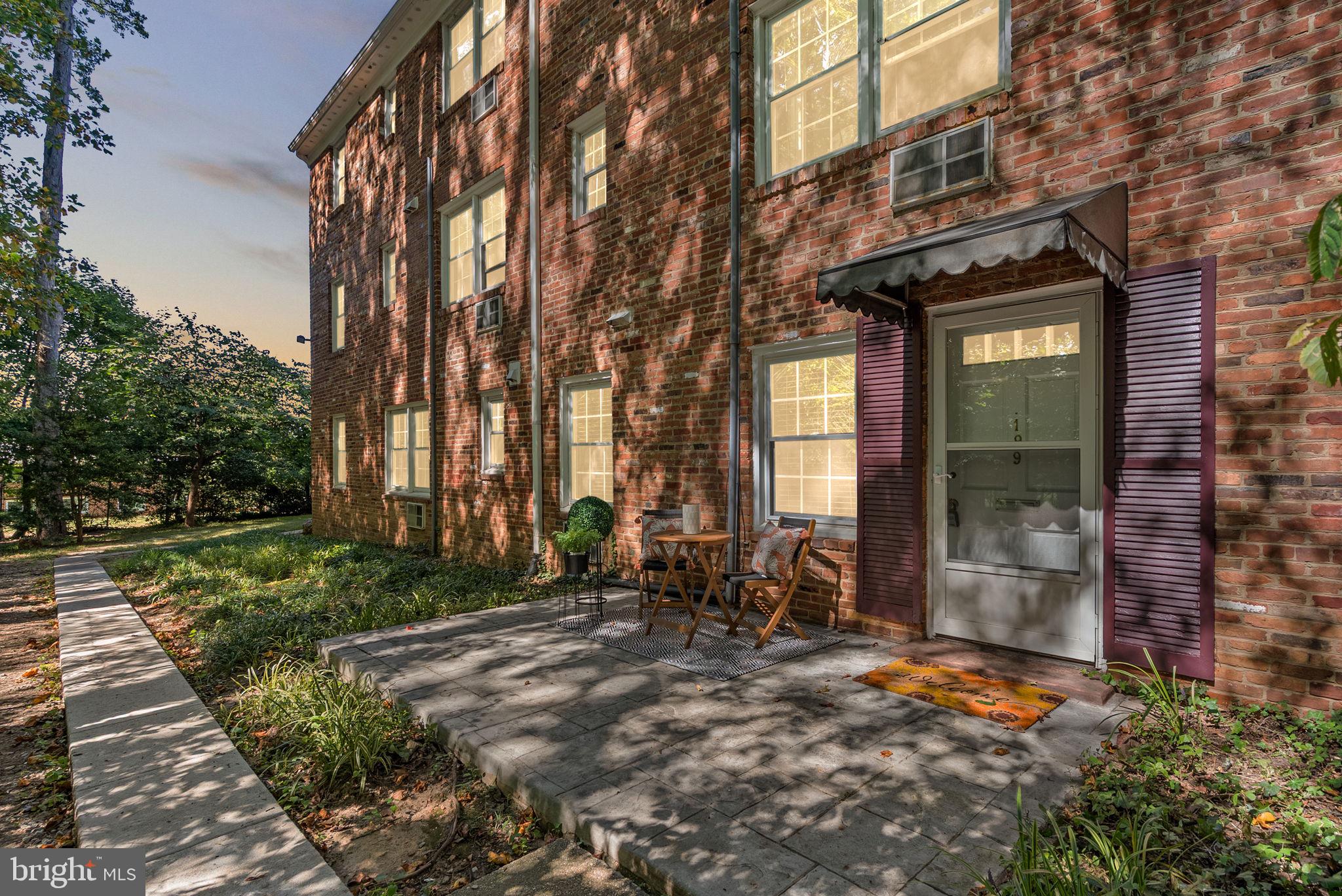 199 Talbott Street, Unit 199 Rockville, MD 20852 - Photo 30 of 31 a view of a brick building with many windows
